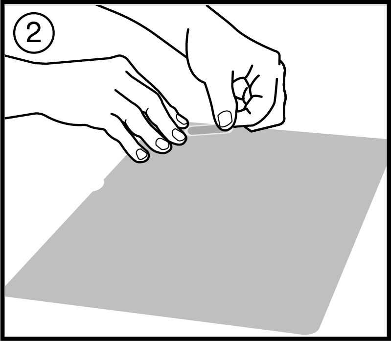 Attaching COMPLY™ attachment bezel fit to laptop
